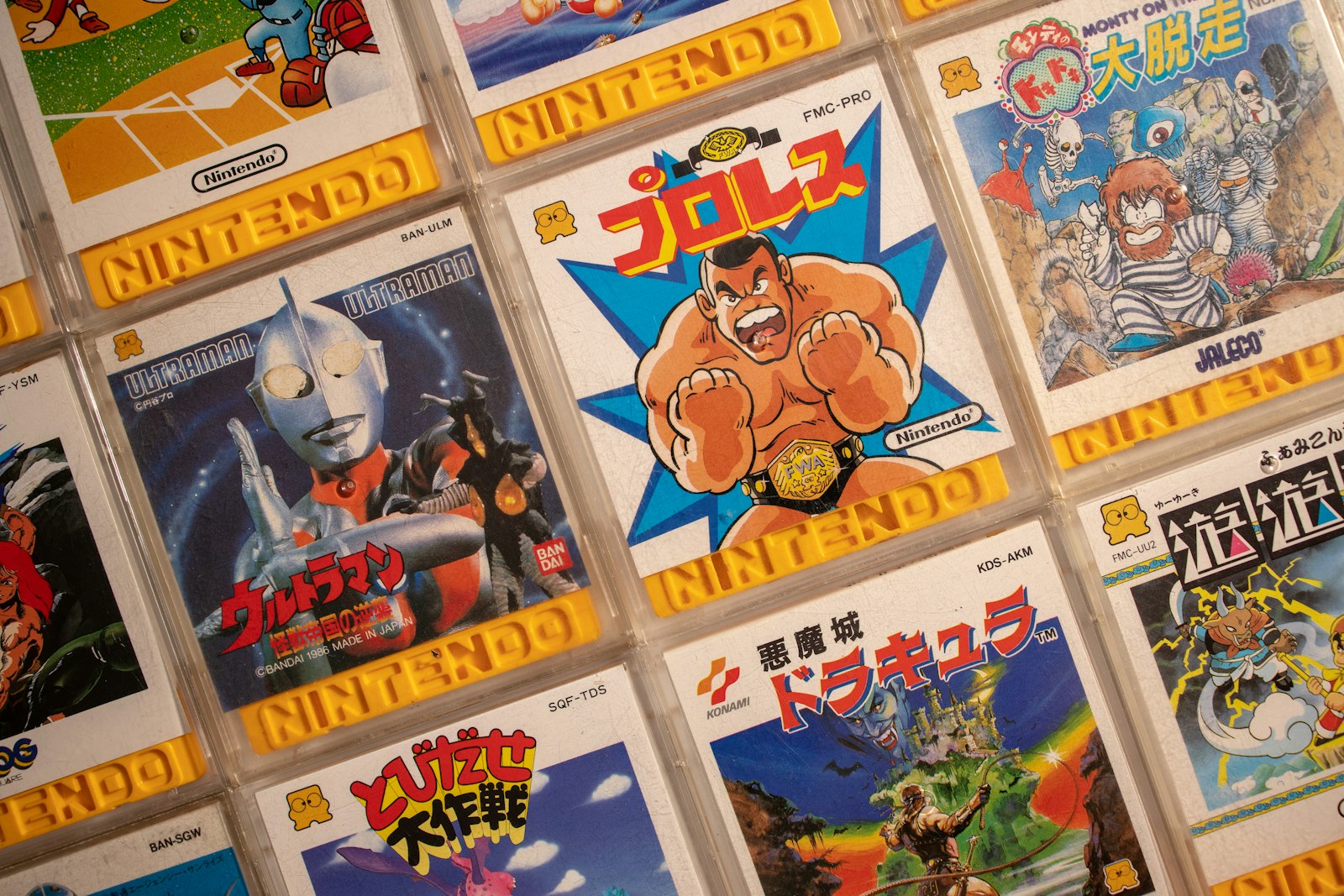 Wall of retro video game boxes with painted cover art